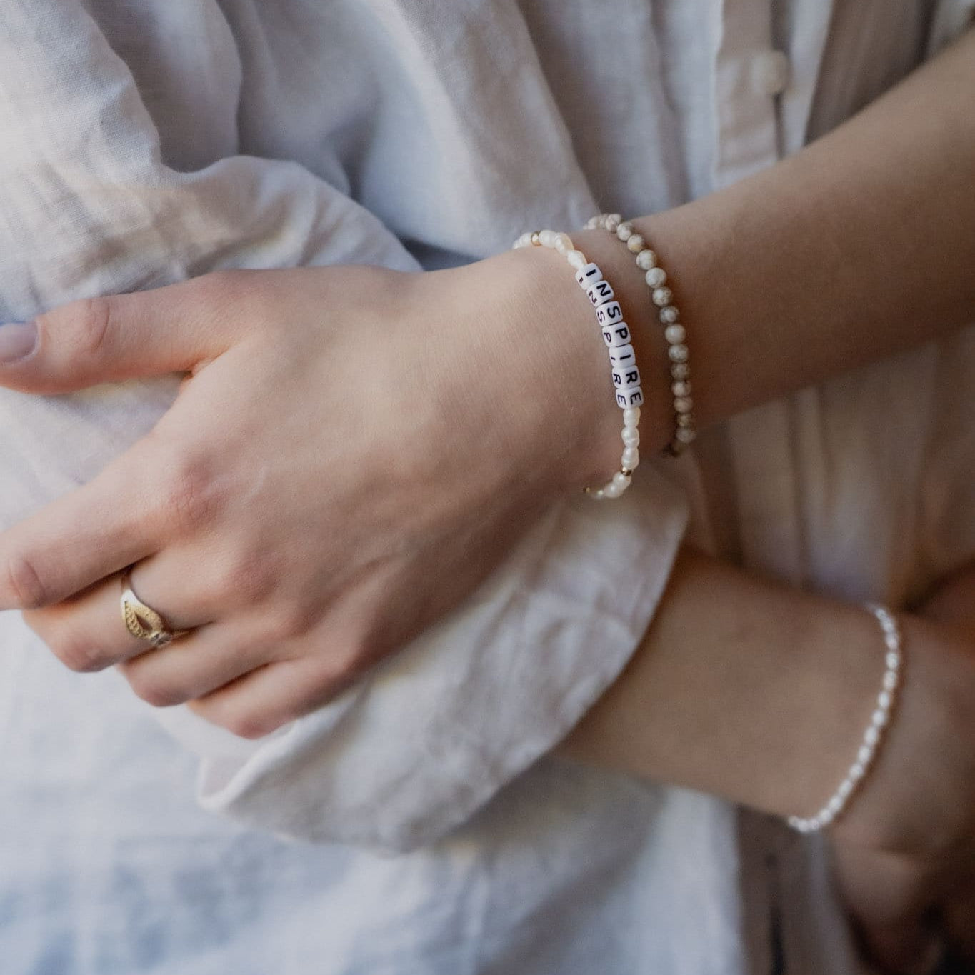 Inspire word bracelet with freshwater pearls